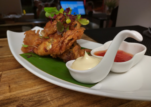 Prawn Fritters on banana leaf with dipping sauces